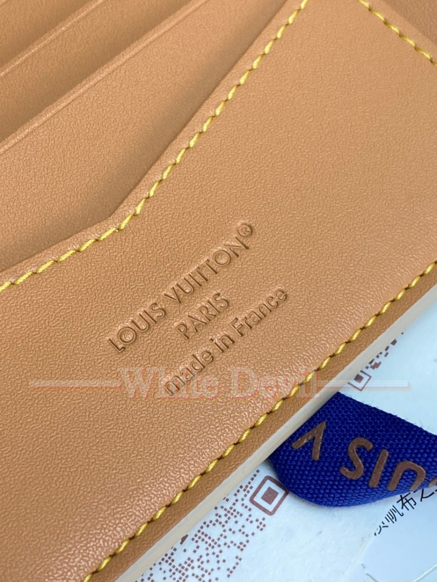 하얀악마 루이비통 지갑 레플리카 (18).jpg