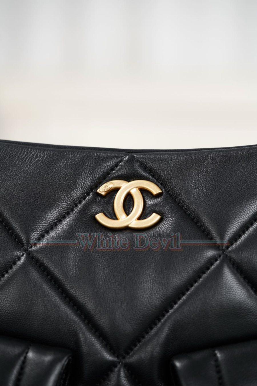 하얀악마 레플리카 샤넬 가방 (14).jpg