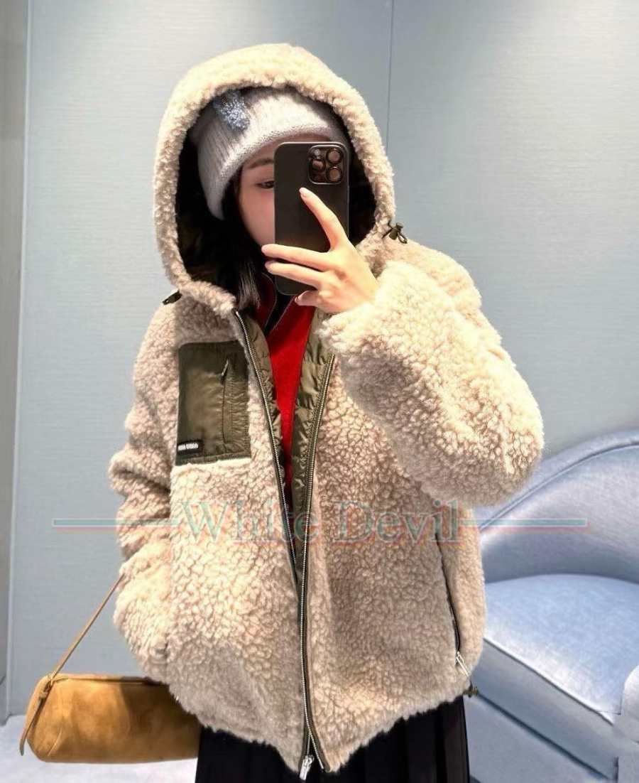 하얀악마 레플리카 미우미우 점퍼 (2).jpg