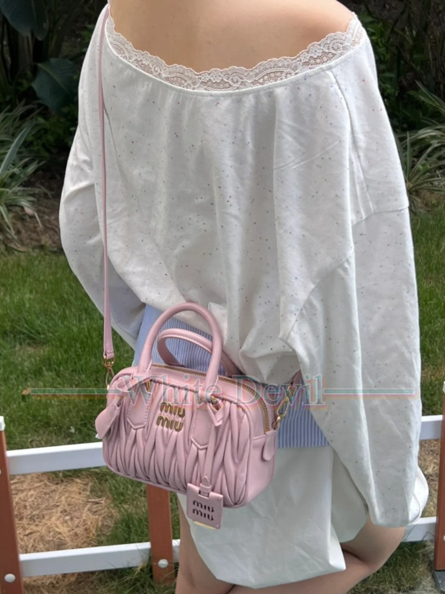 하얀악마 레플리카 미우미우 탑핸들 (2).jpg